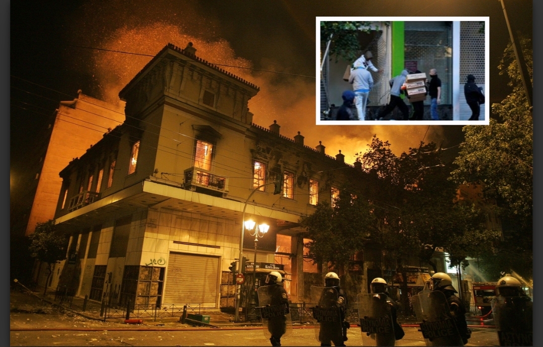 A classic old cinema is seen burning during clashes in central Athens, Greece, following a mass demonstration against the new austerity measures, on 12 February 2012. Greece's parliament is to decide on whether to approve the new round of austerity measures that will allow the country facing bankruptcy to qualify for a second international bailout.